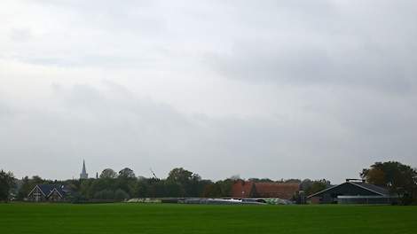 Boerderij in het landschap.