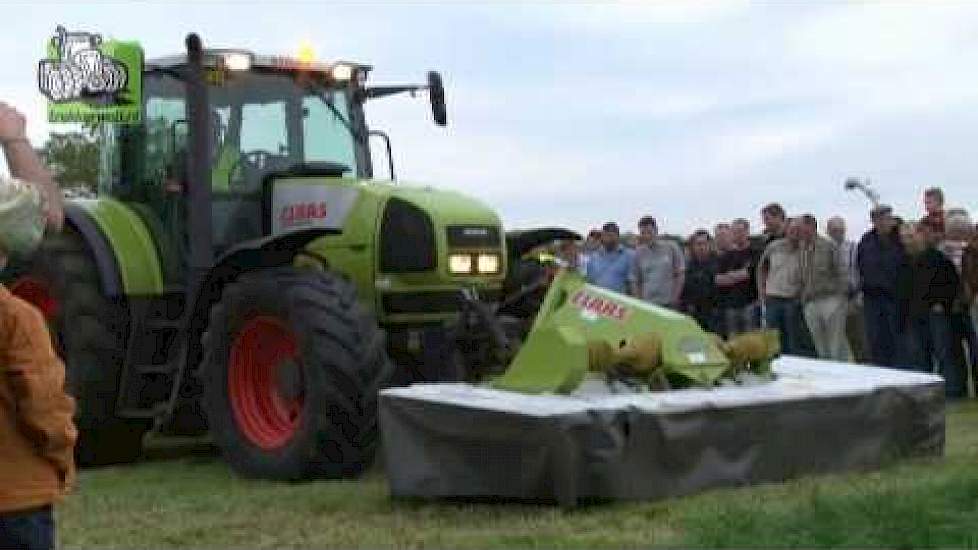 Claas Ares 836 RZ met maaier Disco 3050 FC plus